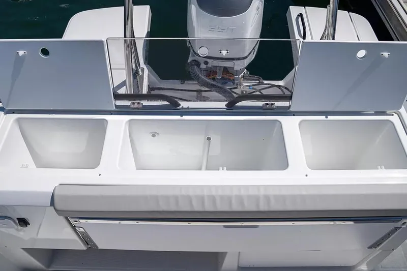 Slide: The Image of Beneteau Flyer 8 SPACEdeck 2026 with spacious storage and motor view. - 12