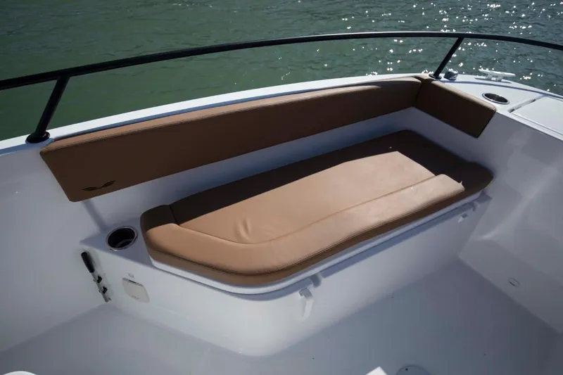 Slide: The Image of 2024 Beneteau Flyer 8 SPACEdeck seating area with brown cushions. - 18