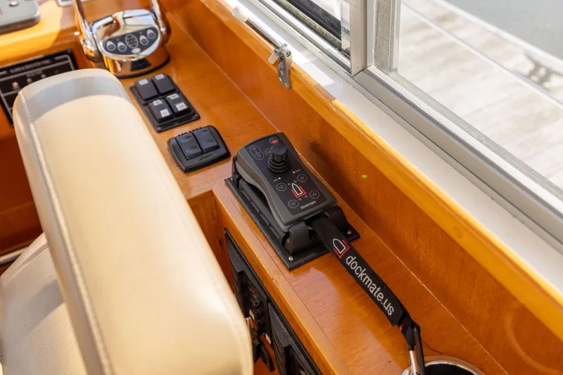 Slide: The Image of Control panel of 2008 Grand Banks 45 Eastbay SX yacht with Dockmate system. - 27