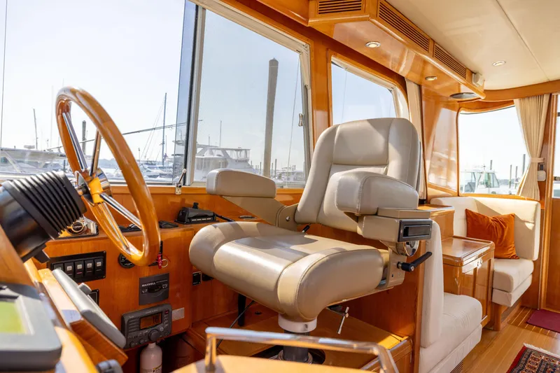 Slide: The Image of Interior of 2008 Grand Banks 45 Eastbay SX yacht with helm and seating area. - 34