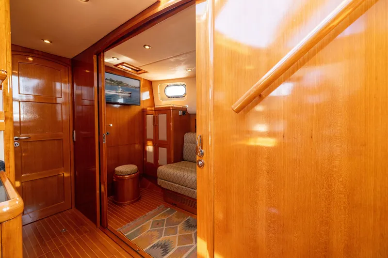 Slide: The Image of Luxurious interior of 2008 Grand Banks 45 Eastbay SX yacht with polished wood finish. - 38