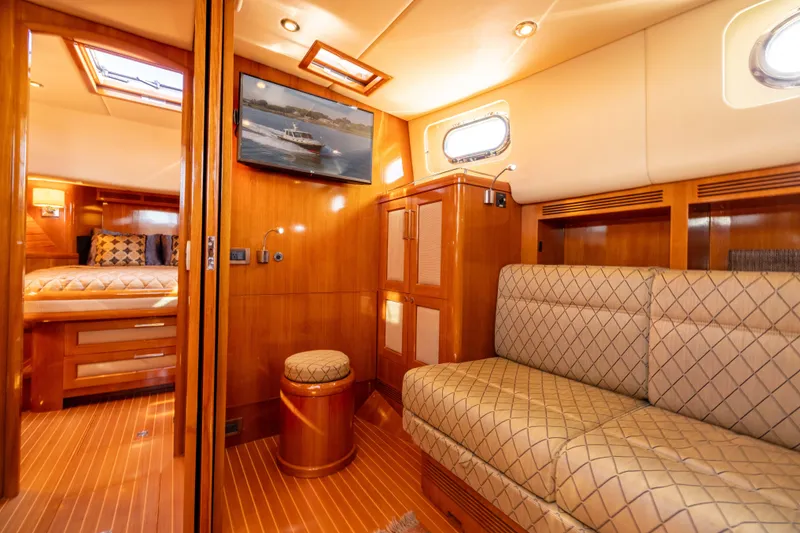 Slide: The Image of Luxurious interior of 2008 Grand Banks 45 Eastbay SX yacht with elegant wood finishes. - 40