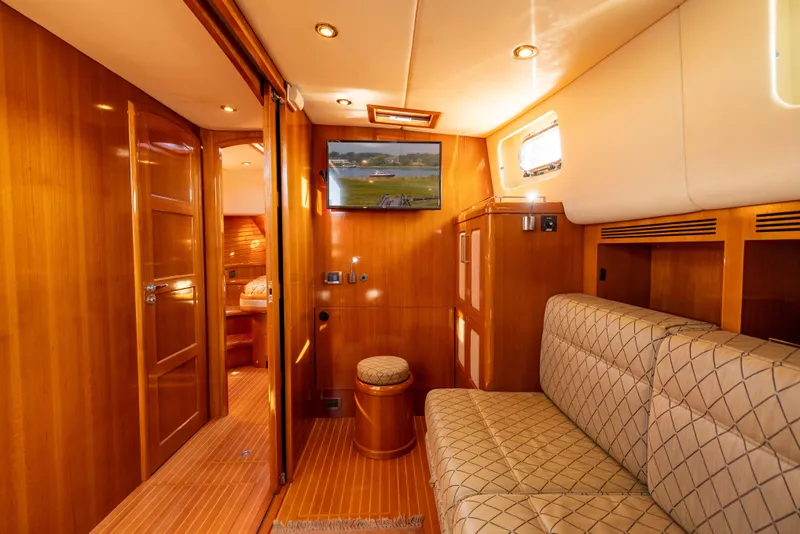 Slide: The Image of Luxurious interior of 2008 Grand Banks 45 Eastbay SX yacht with elegant wood finish. - 41