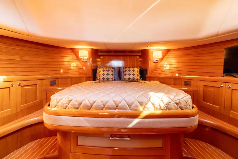Slide: The Image of Luxurious cabin interior of 2008 Grand Banks 45 Eastbay SX yacht with elegant wood finish. - 45