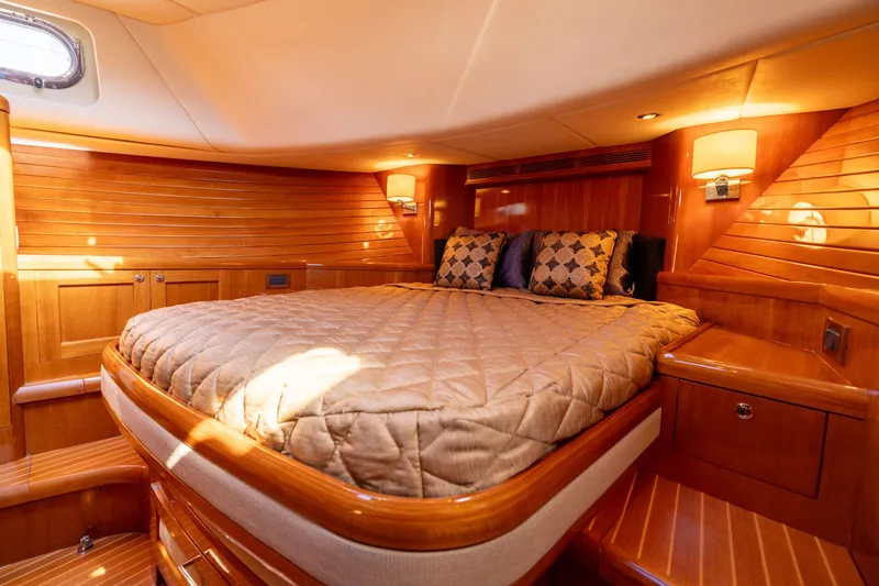 Slide: The Image of Luxurious cabin interior of 2008 Grand Banks 45 Eastbay SX yacht with elegant wood finish. - 47