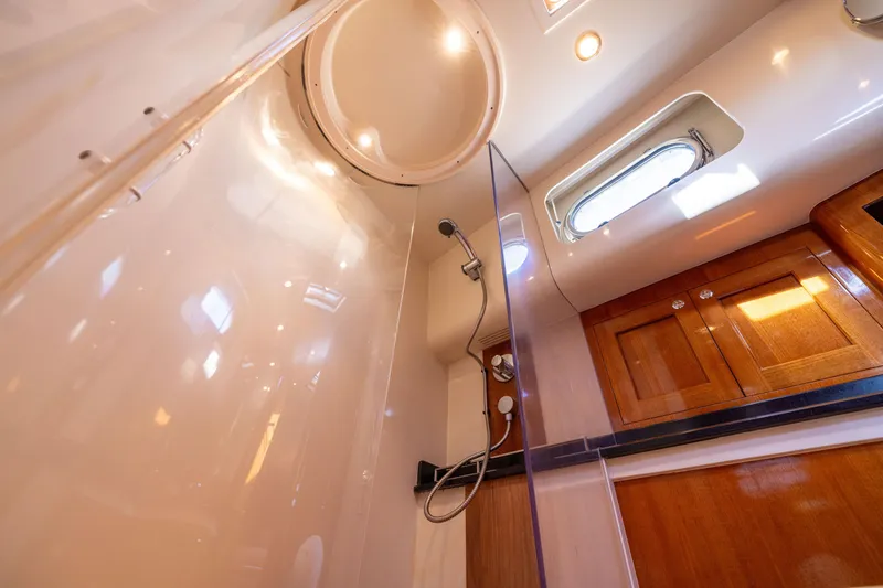 Slide: The Image of Luxurious bathroom interior of 2008 Grand Banks 45 Eastbay SX yacht with wooden cabinetry. - 53