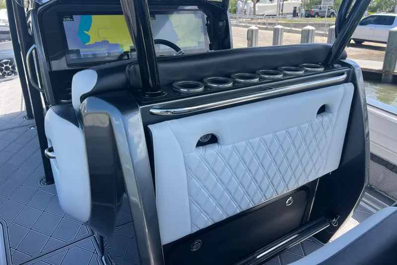 Slide: The Image of 2022 Nor-Tech 390 Sport Center Console interior with sleek design and advanced navigation system. - 8