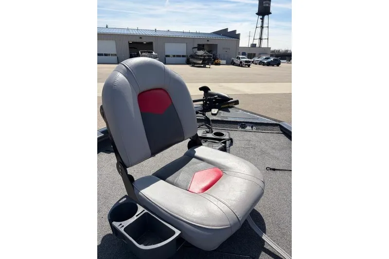 Slide: The Image of Gray and red seat on 2016 Tracker Pro Team 195 TXW Tournament Edition boat. - 10