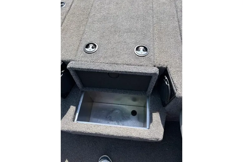 Slide: The Image of 2016 Tracker Pro Team 195 TXW Tournament Edition boat storage compartment, open and empty. - 14