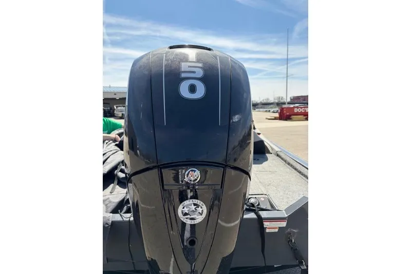 Slide: The Image of 2016 Tracker Pro Team 195 TXW Tournament Edition boat engine, featuring a 50 horsepower motor. - 17