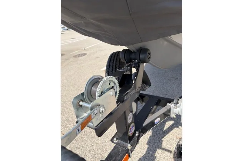 Slide: The Image of Trailer winch system of a 2016 Tracker Pro Team 195 TXW Tournament Edition boat. - 18