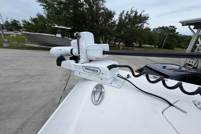 Slide: The Image of 2021 Fountain 34 Center Console with Minn Kota trolling motor on deck. - 18