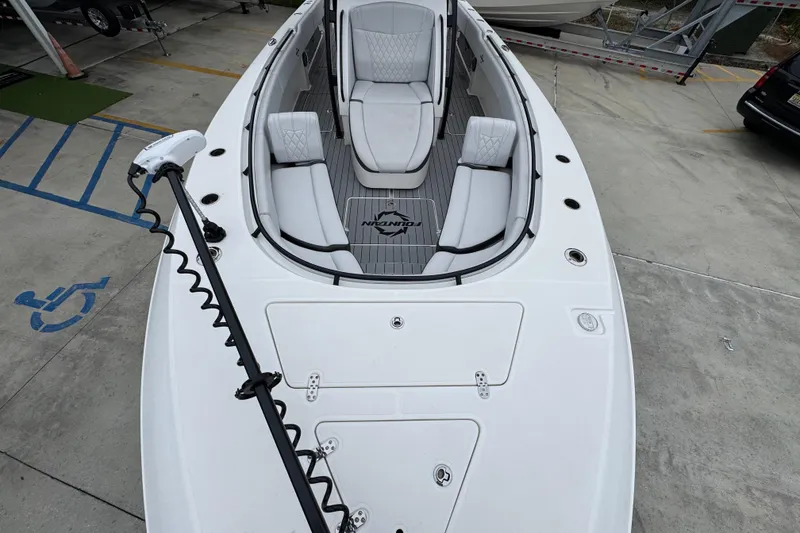 Slide: The Image of 2021 Fountain 34 Center Console boat with spacious seating and sleek design. - 19