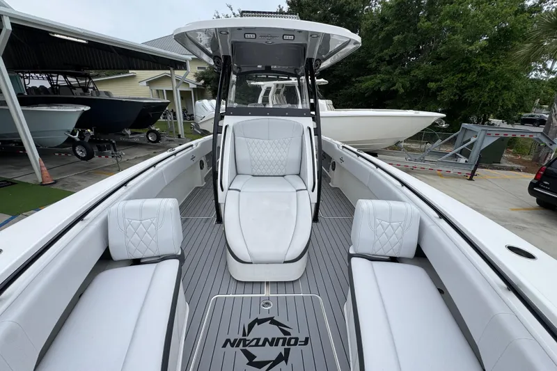 Slide: The Image of 2021 Fountain 34 Center Console boat with sleek seating and modern design. - 21