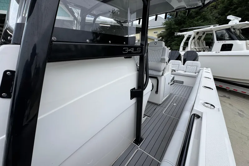 Slide: The Image of 2021 Fountain 34 Center Console boat interior with sleek seating and modern design. - 23
