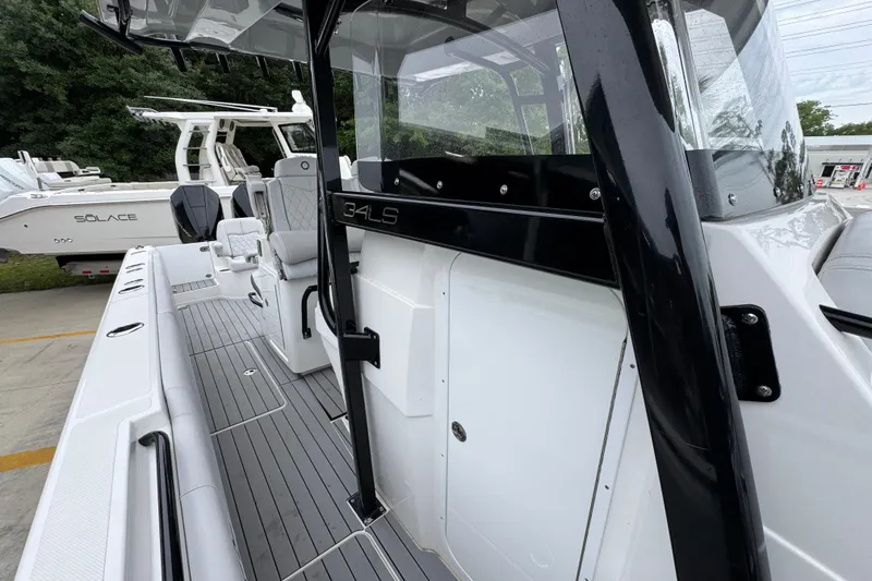 Slide: The Image of 2021 Fountain 34 Center Console boat with sleek design and modern features. - 24