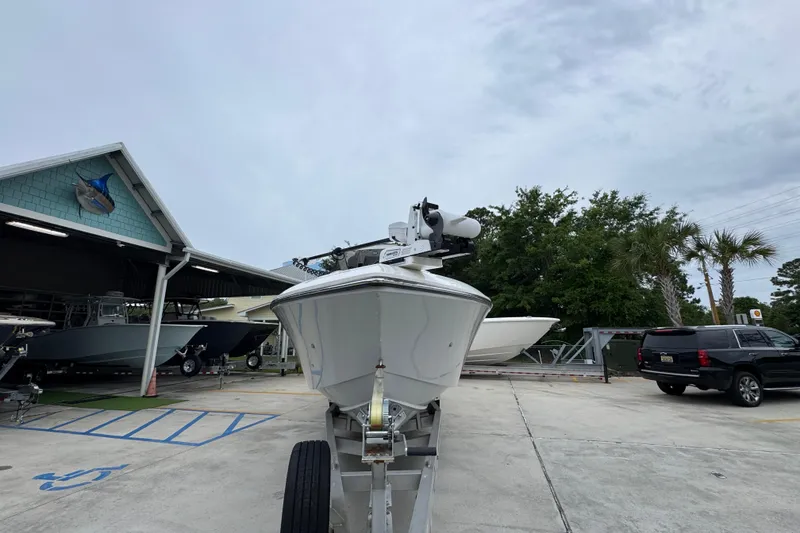 Slide: The Image of 2021 Fountain 34 Center Console boat on trailer at marina. - 6
