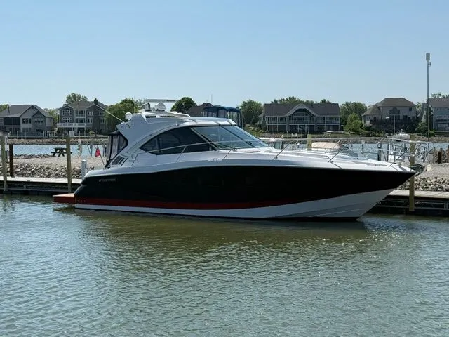 Slide: The Image of 2009 Four Winns V435 yacht docked on a sunny day. - 1