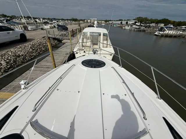 Slide: The Image of 2009 Four Winns V435 yacht in harbor, front deck view. - 3