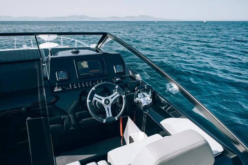 Slide: The Image of 2024 Beneteau Flyer 10 cockpit with ocean view. - 22