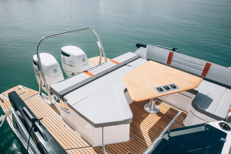 Slide: The Image of 2024 Beneteau Flyer 10 boat with spacious deck and seating area. - 40