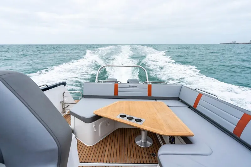 Slide: The Image of Beneteau Flyer 10 2026 at sea with stylish deck and seating area. - 46