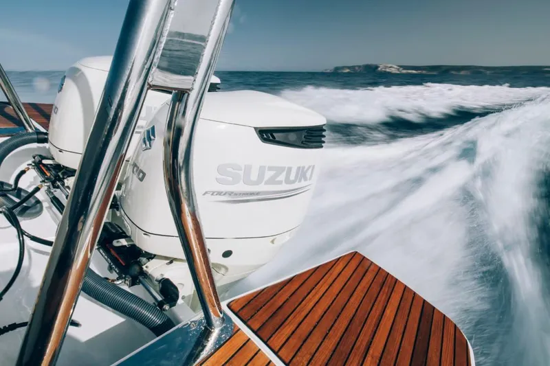 Slide: The Image of 2026 Beneteau Flyer 10 with Suzuki engine on open sea. - 48