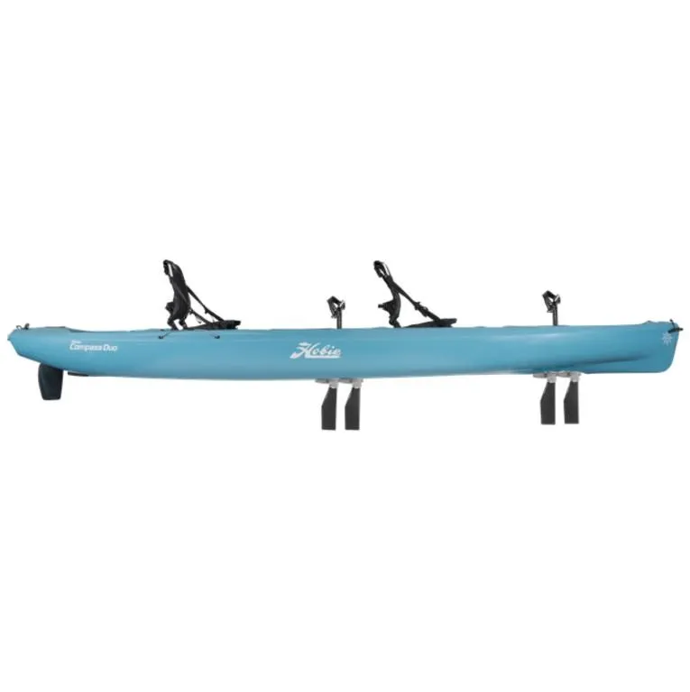 Slide: The Image of 2023 Hobie Compass Duo kayak with dual seats and pedal drive system. - 5