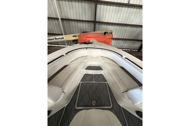 Slide: The Image of 2022 Fountain 34 Center Console boat interior with cushioned seating and sleek design. - 13