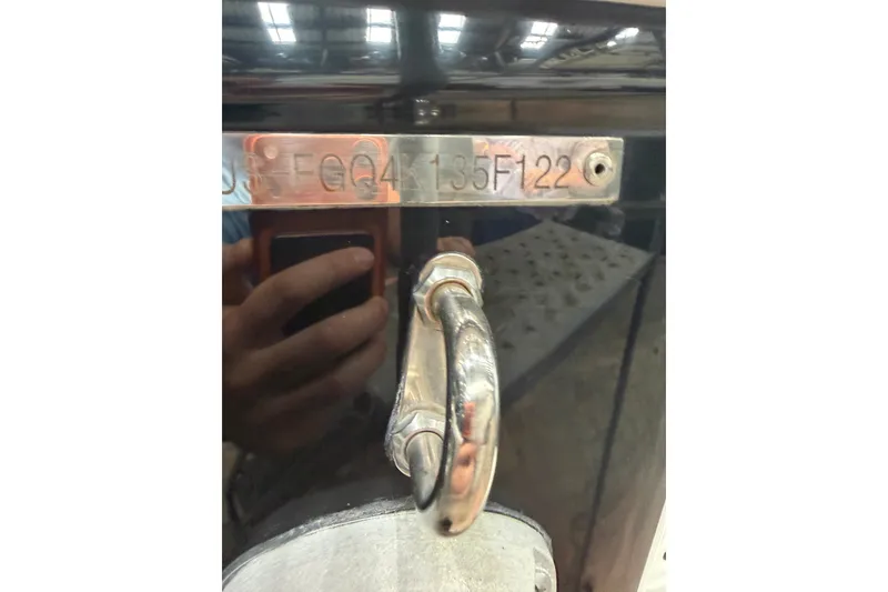 Slide: The Image of Close-up of a 2022 Fountain 34 Center Console boat's identification plate. - 20