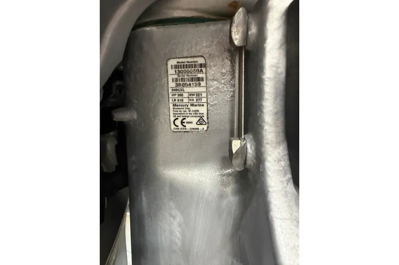 Slide: The Image of Close-up of a 2022 Fountain 34 Center Console engine label with specifications. - 22