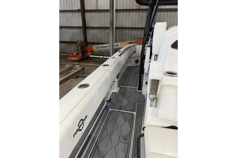 Slide: The Image of 2022 Fountain 34 Center Console boat interior with sleek seating and modern design. - 4