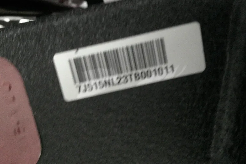 Slide: The Image of Barcode label on a 2026 Tahoe 2150 product, displaying serial number. - 8