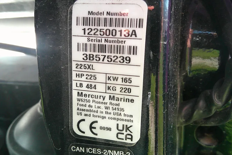Slide: The Image of Label on Mercury Marine engine, model 225XL, with specifications and serial numbers. - 14