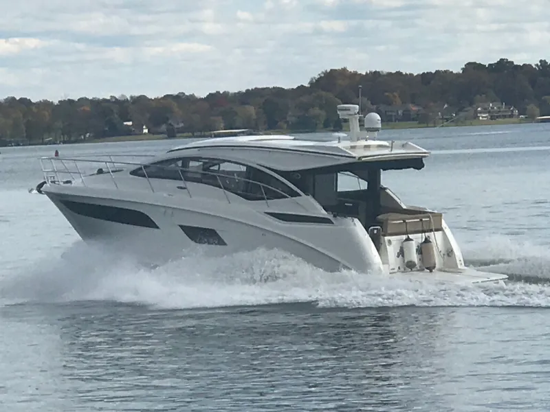 Slide: The Image of 2017 Sea Ray Sundancer 400 cruising on a calm lake. - 1