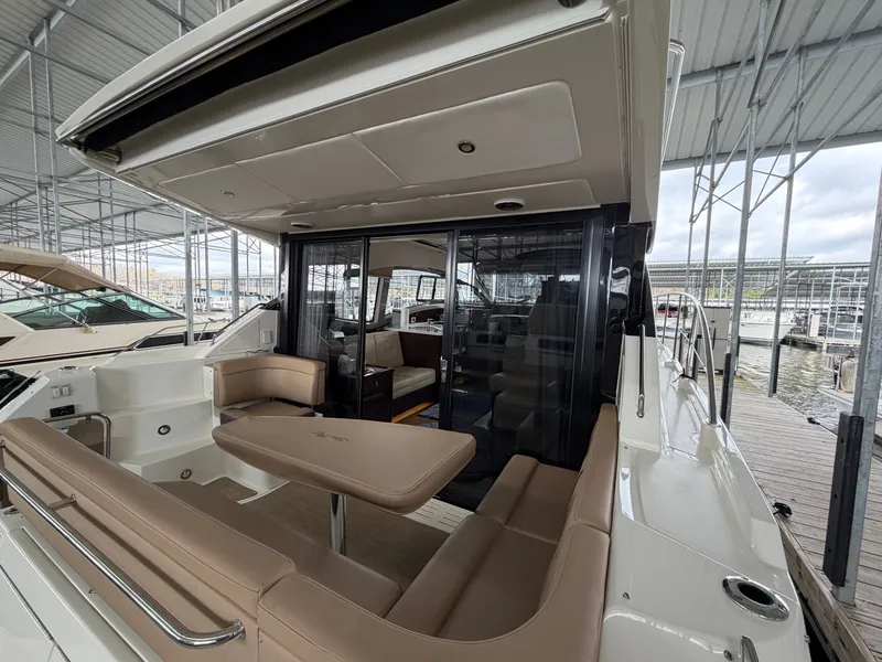 Slide: The Image of 2017 Sea Ray Sundancer 400 yacht with sleek interior at the marina. - 13