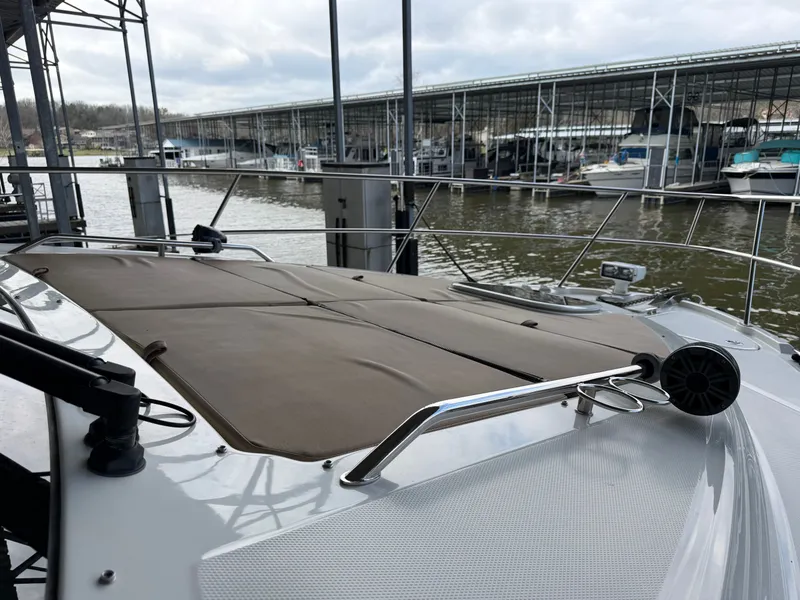 Slide: The Image of 2017 Sea Ray Sundancer 400 docked at a serene marina. - 17