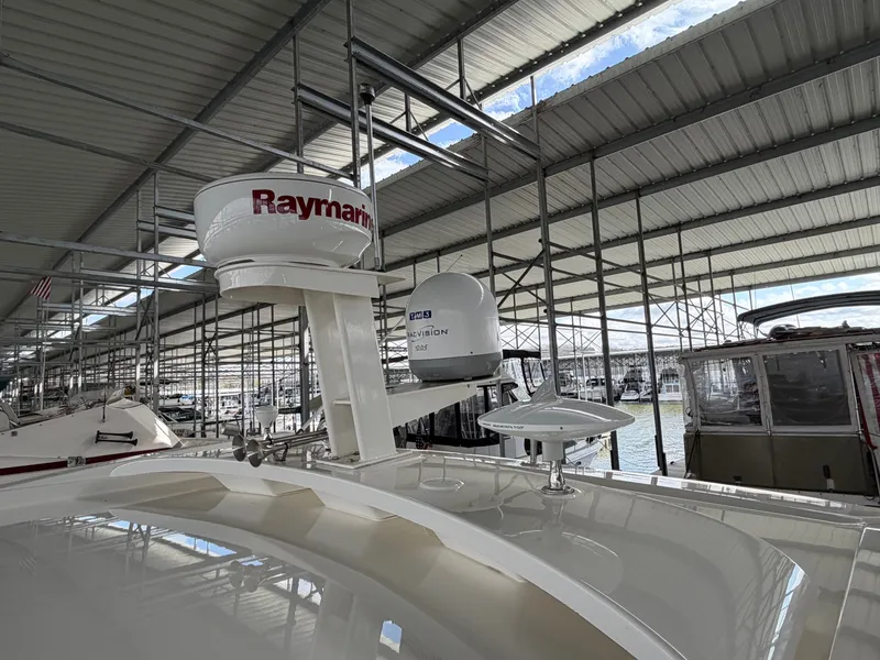 Slide: The Image of 2017 Sea Ray Sundancer 400 with Raymarine equipment in marina. - 20
