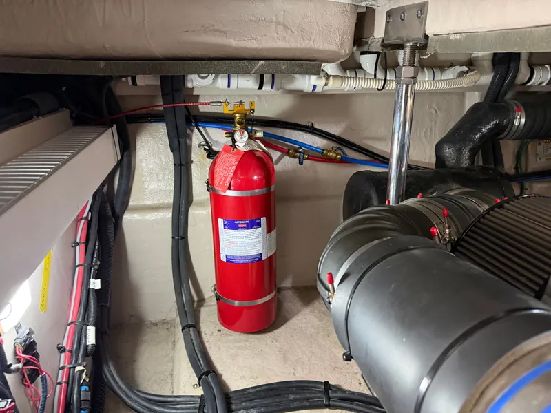 Slide: The Image of Engine room of 2017 Sea Ray Sundancer 400 with fire extinguisher. - 41