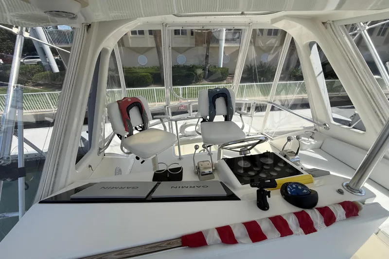 Slide: The Image of Interior view of a 1997 Ocean Yachts 40 Super Sport cockpit with navigation equipment. - 25