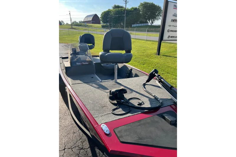 Slide: The Image of 2026 Tracker Bass Tracker Classic XL boat with seating and fishing equipment on deck. - 6