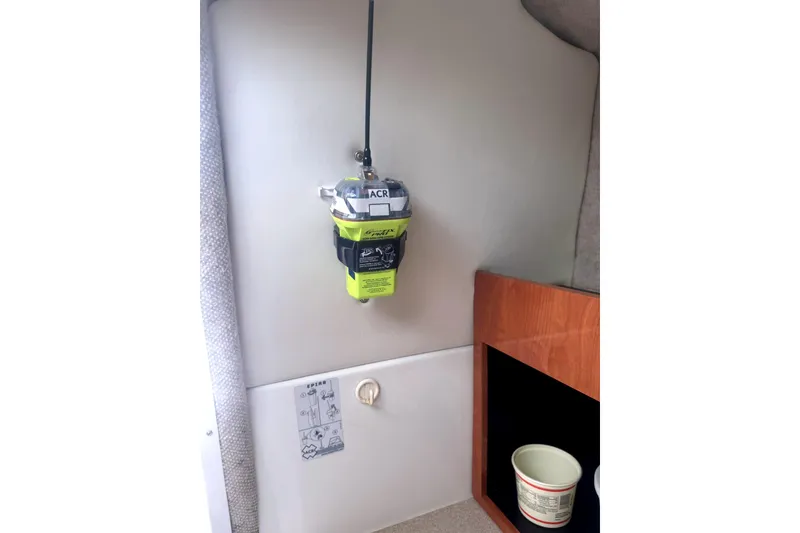 Slide: The Image of Emergency beacon mounted inside 2007 Sailfish 2660 WAC boat cabin. - 18