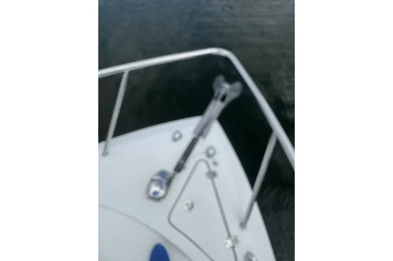 Slide: The Image of Bow of a 2007 Sailfish 2660 WAC boat with railing and anchor. - 5