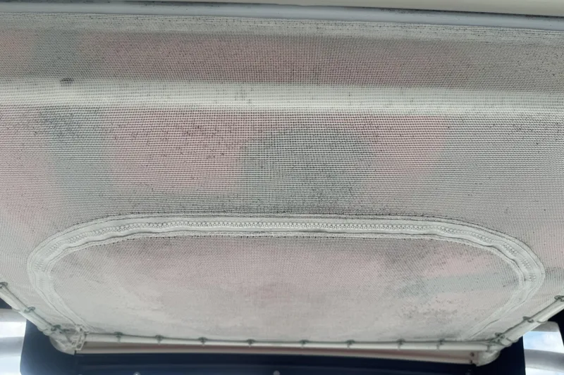 Slide: The Image of Interior view of 2007 Sailfish 2660 WAC boat canopy with mesh cover. - 7