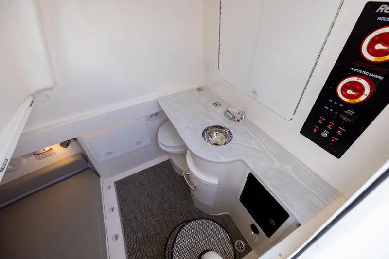Slide: The Image of 2024 Regulator 34 boat interior with modern sink and control panel. - 51