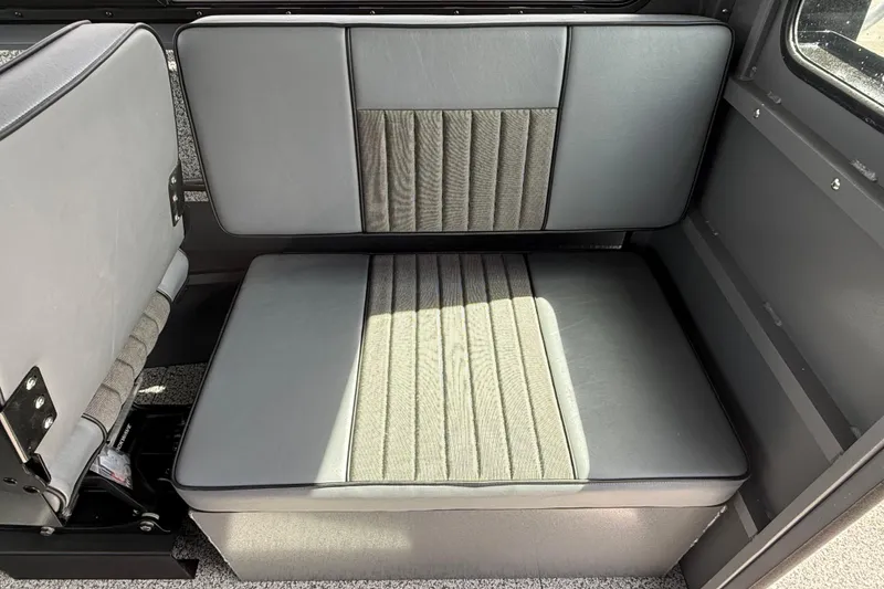 Slide: The Image of 2026 Alumaweld Intruder 22 HT interior seating with gray upholstery and modern design. - 14