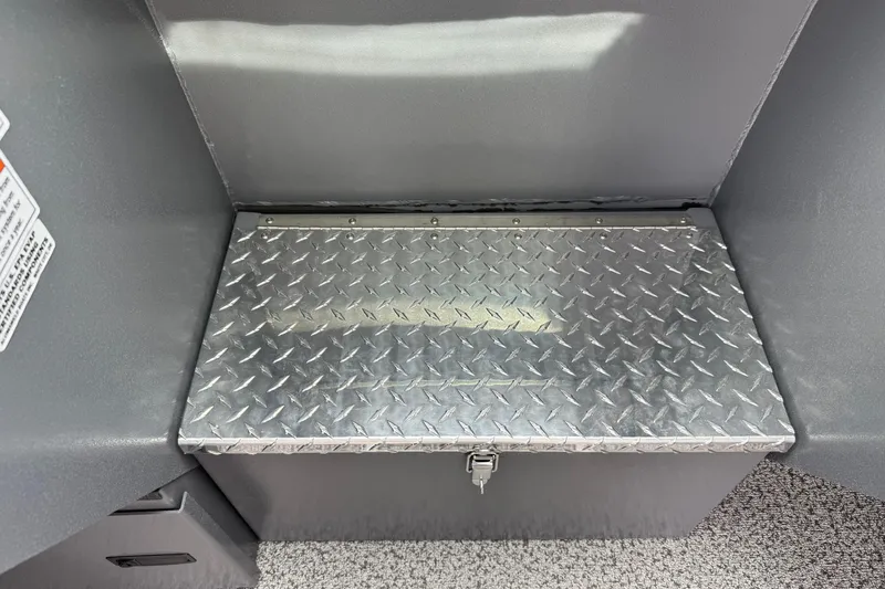 Slide: The Image of Alumaweld Intruder 22 HT 2026, diamond plate storage compartment, secure latch, durable design. - 16