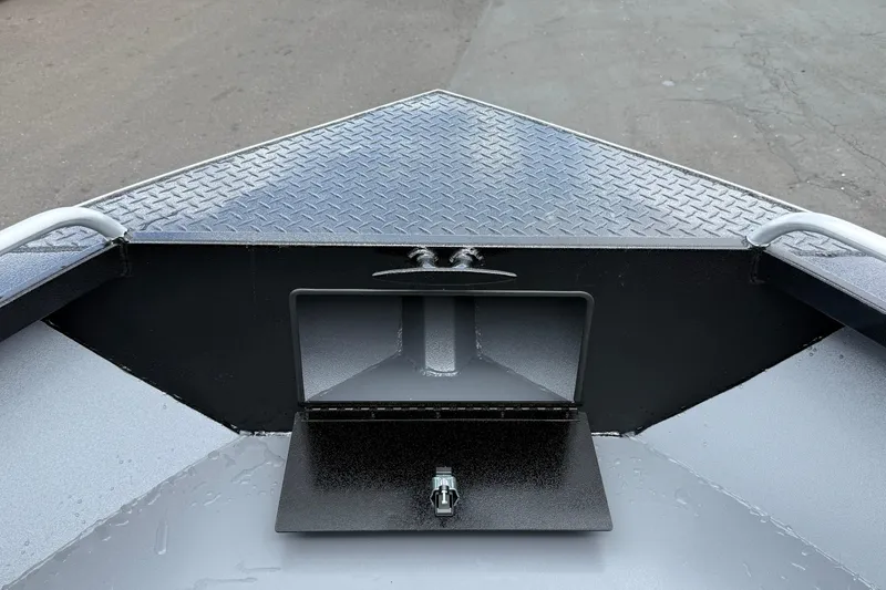 Slide: The Image of Bow of 2026 Alumaweld Intruder 22 HT with diamond plate deck and storage compartment. - 30
