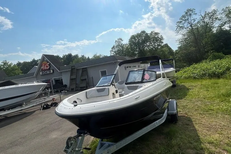 Slide: The Image of 2023 Bayliner VR4 Bowrider OB displayed at A&S Boats dealership. - 4