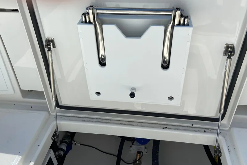 Slide: The Image of Regulator 31 boat 2026, storage compartment with hydraulic supports. - 10